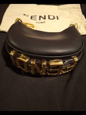 Fendi Black Mini Baguette with Gold Lettering